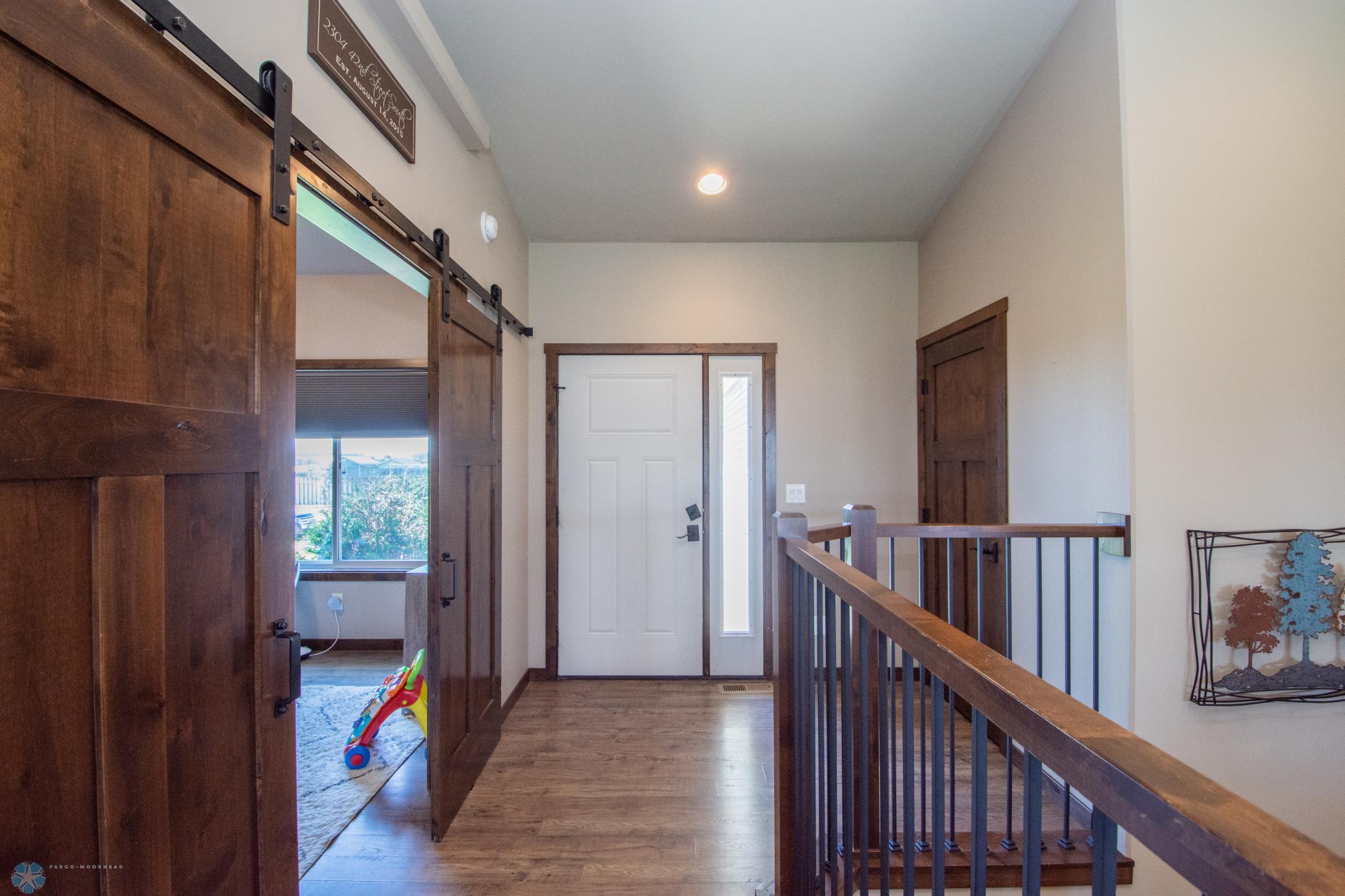 Large Foyer with Bedroom/Office accessible through sliding doors