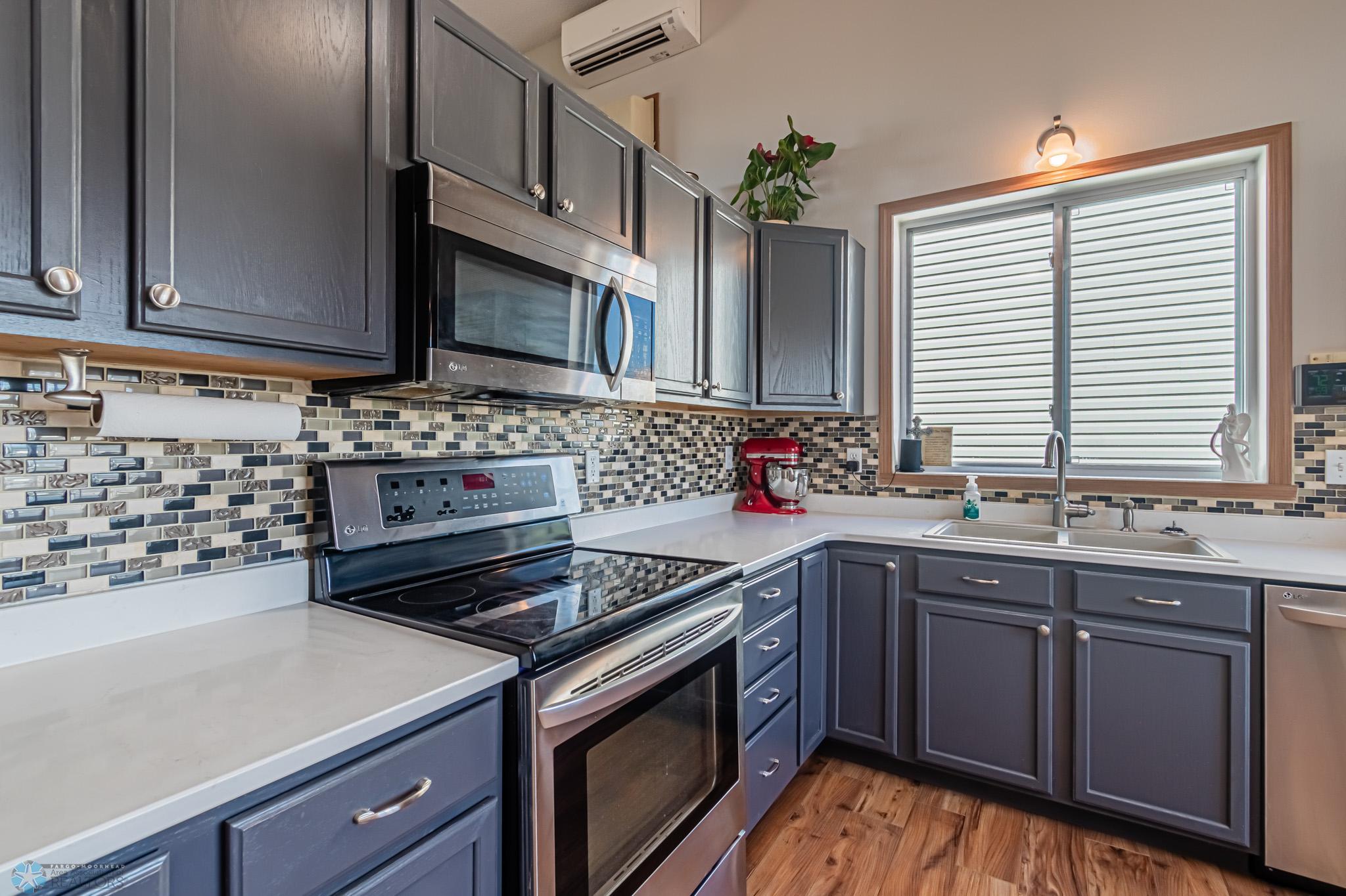 Quartz Countertops & Tiled backsplash added!