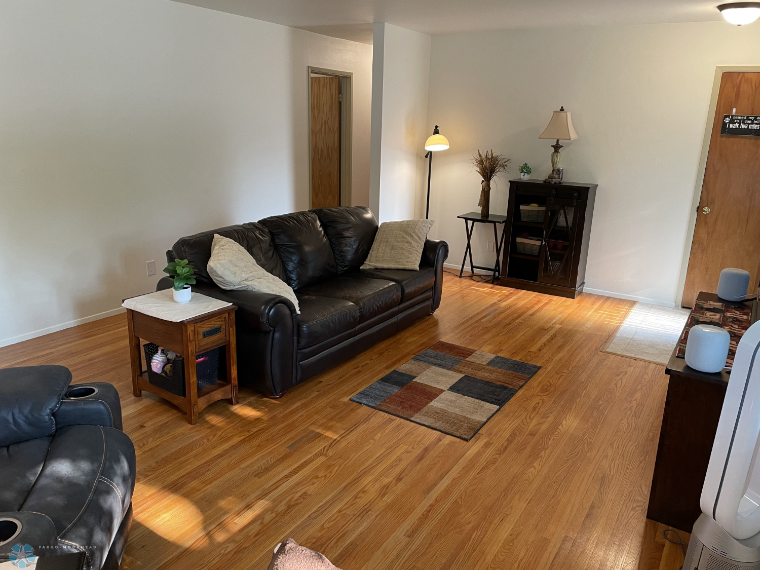 Large living room with solid oak floor - view 3.png