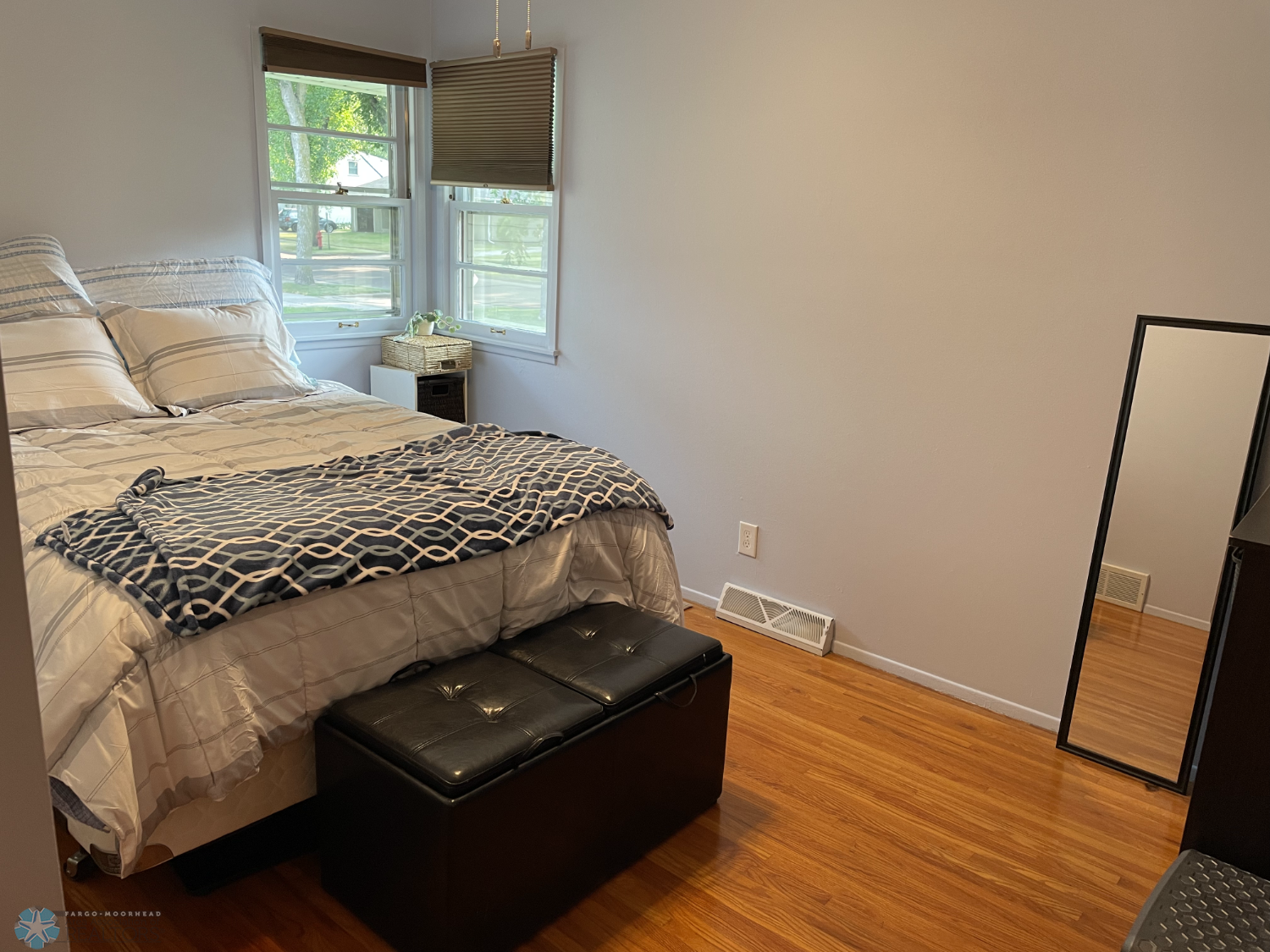 Bedroom 1 with solid oak floor - view from door.png
