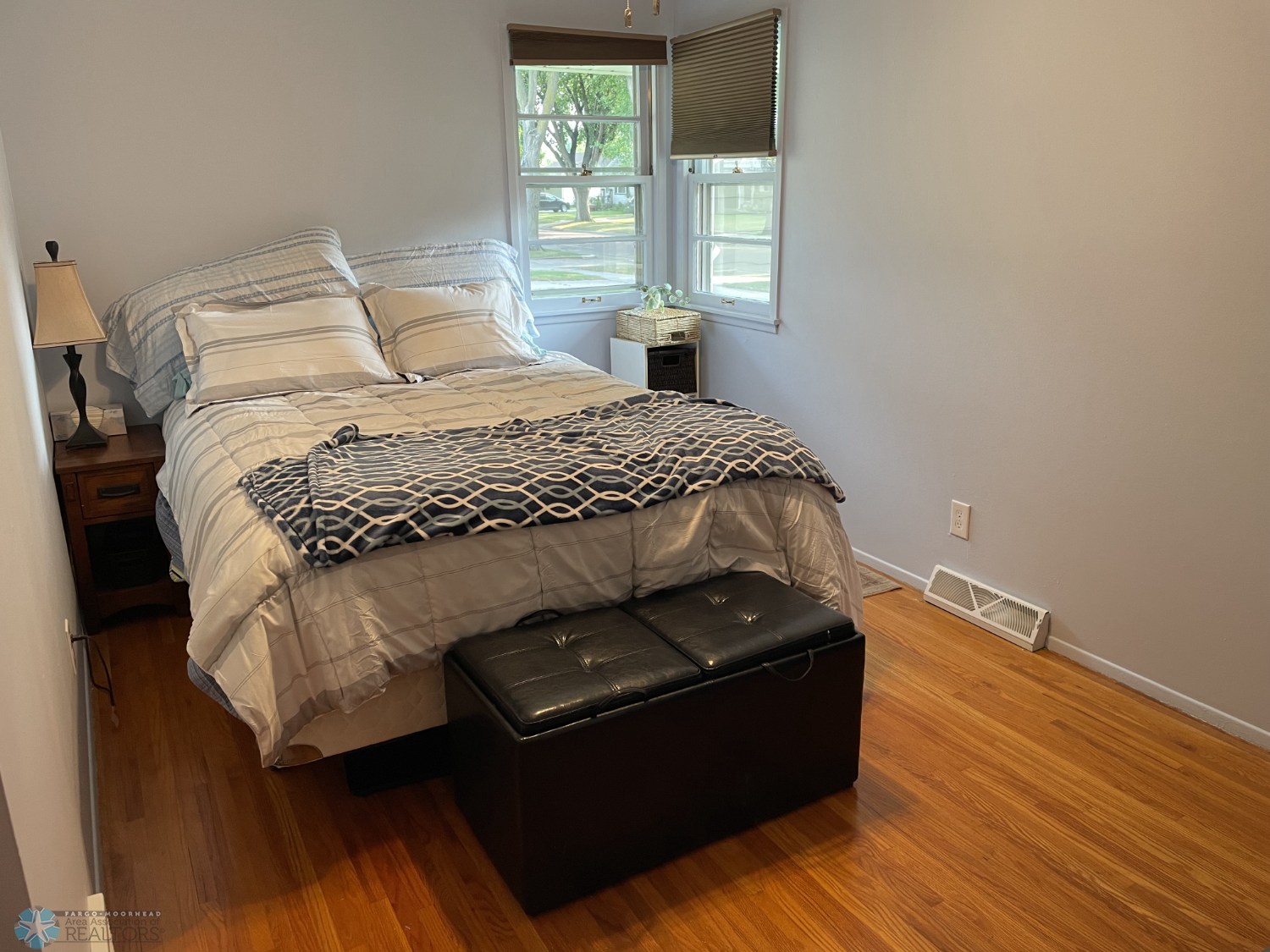 Bedroom 1 with solid oak floor - view from closet.png