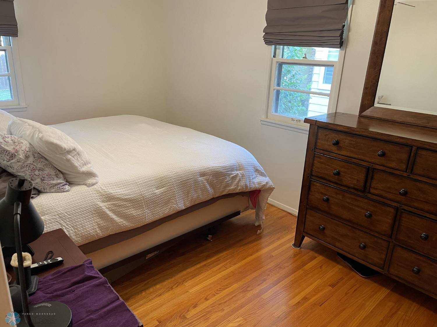 Bedroom 2 with solid oak floor - view from door.png