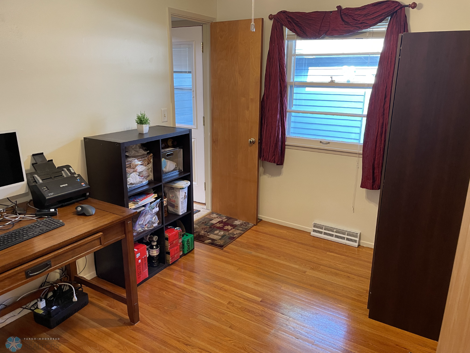 Bedroom 3 with solid oak floor - view 1 - Armoire included.png