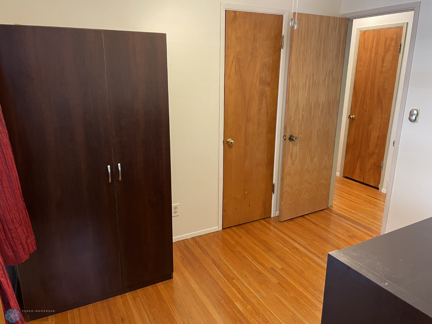 Bedroom 3 with solid oak floor - view 2 - Armoire included.png