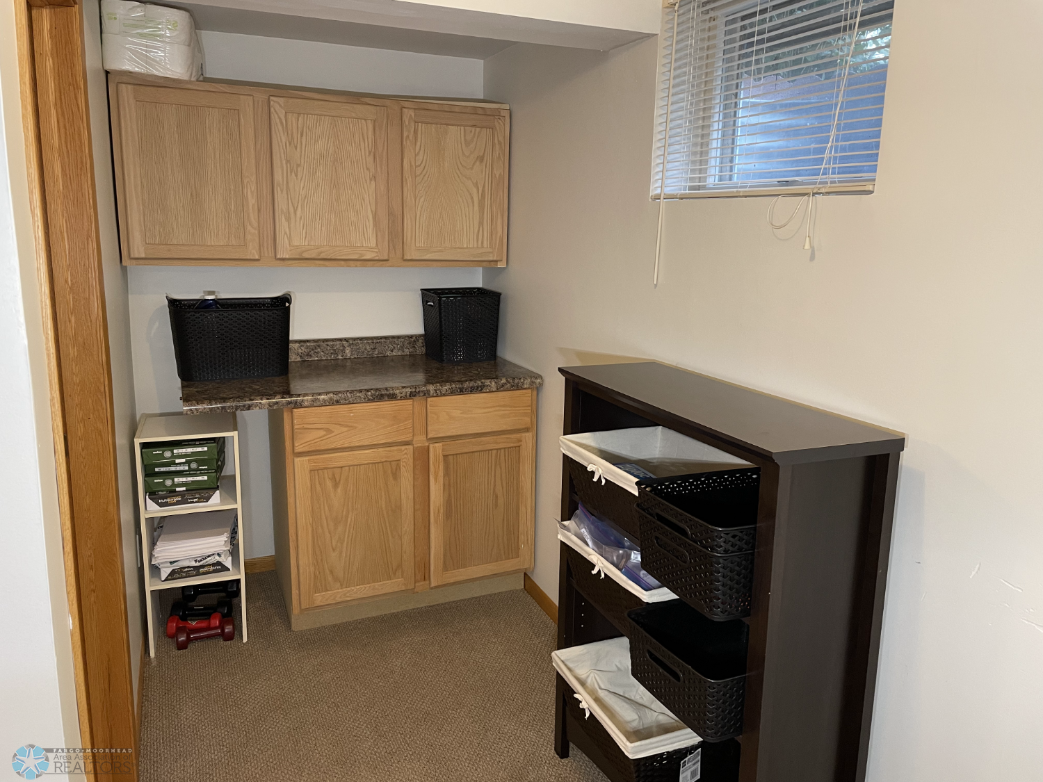 Finished area with cabinets & closet next to basement bathroom - view 4.png