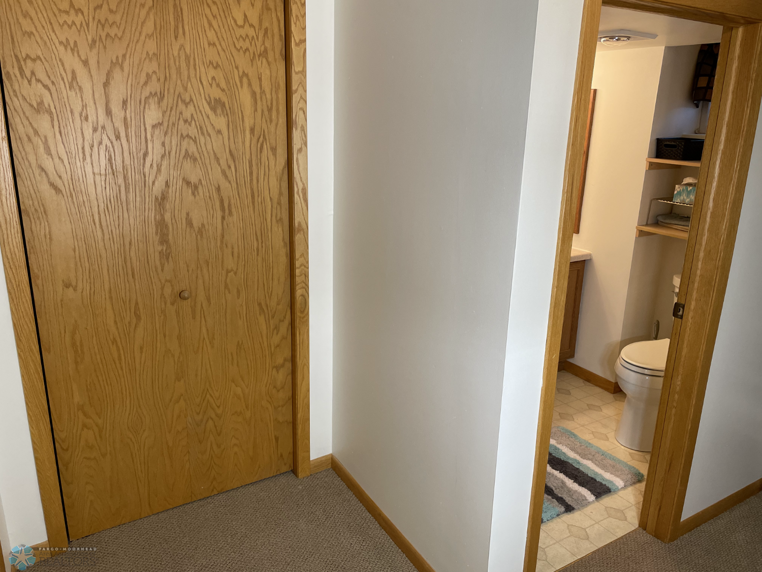 Finished area with cabinets & closet next to basement bathroom - view 3 .png
