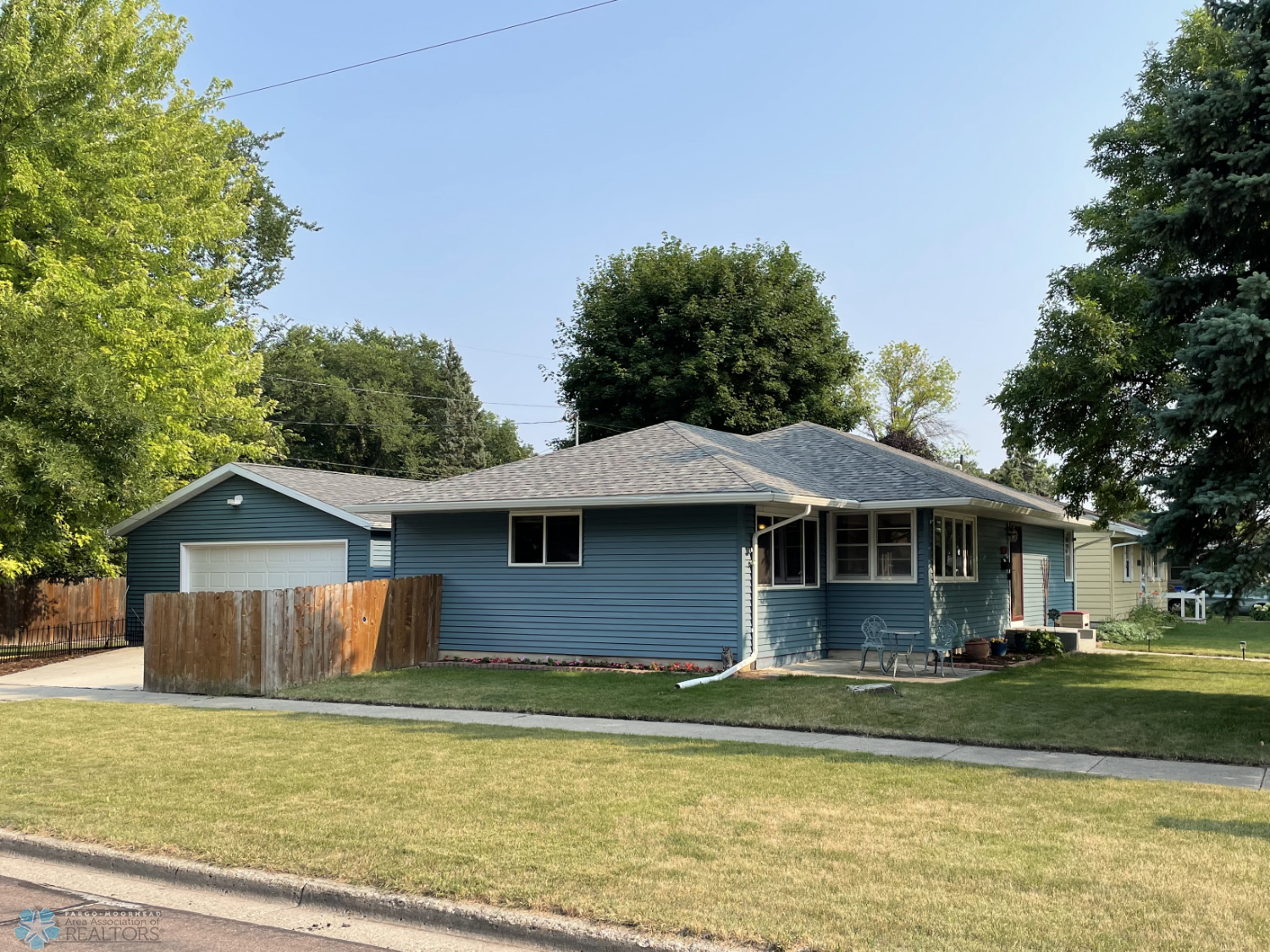 Steel-sided rambler with extra big 24 x 30 double garage