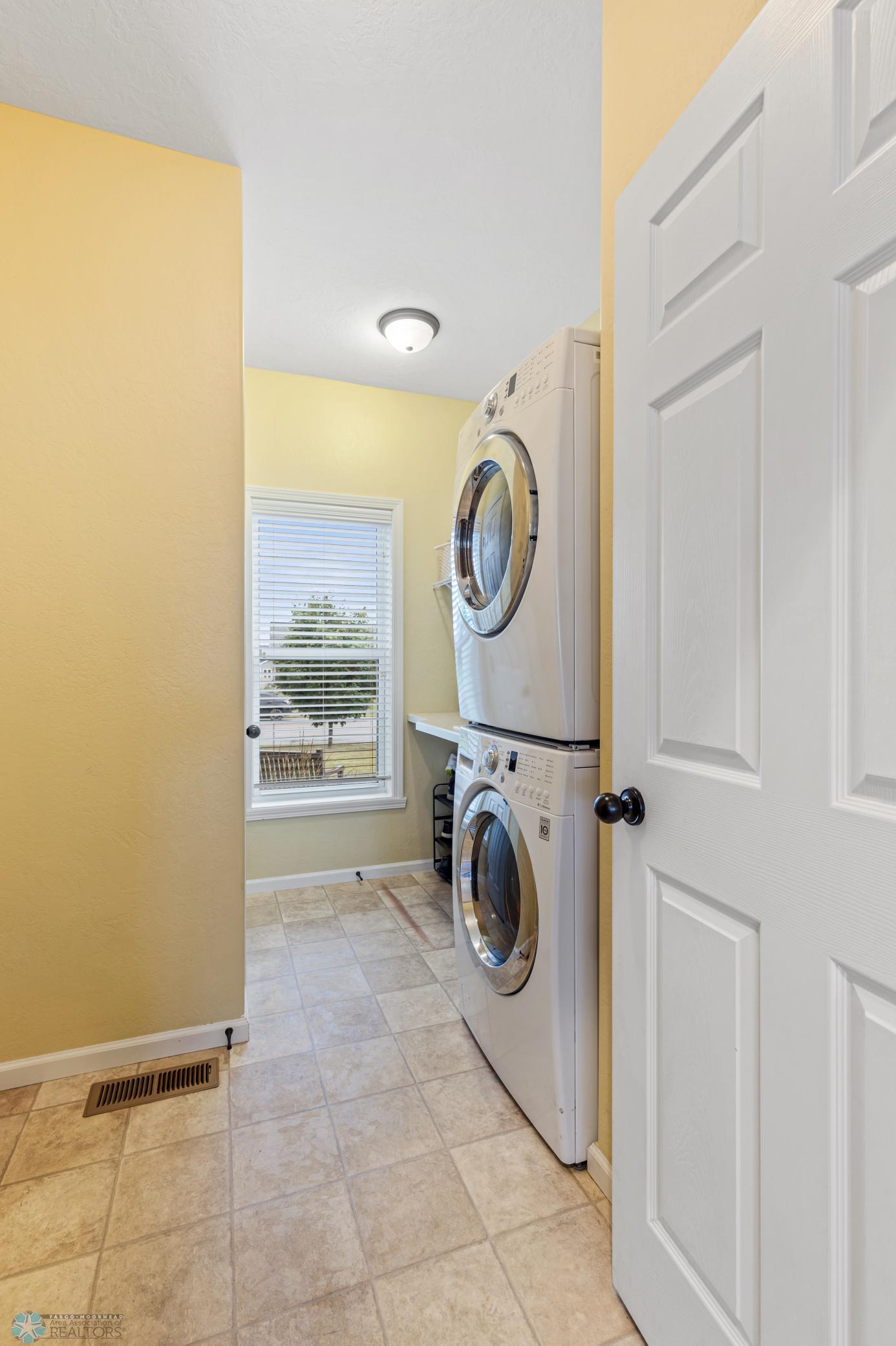 Main floor laundry/mud room off garage