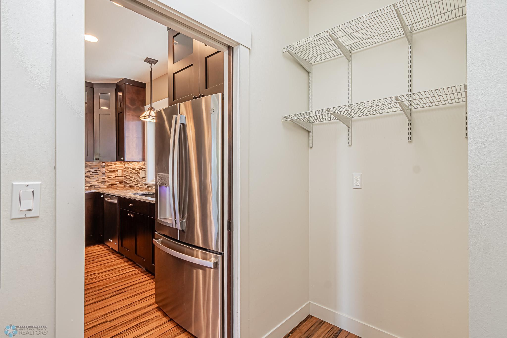 View from Walk-in pantry to kitchen with space for your Freezer & Beverage Frig