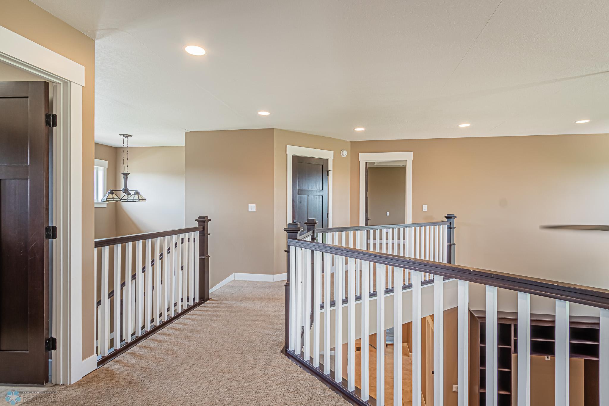 2nd Story Hallway between Primary Suite & 2 other Bedrooms