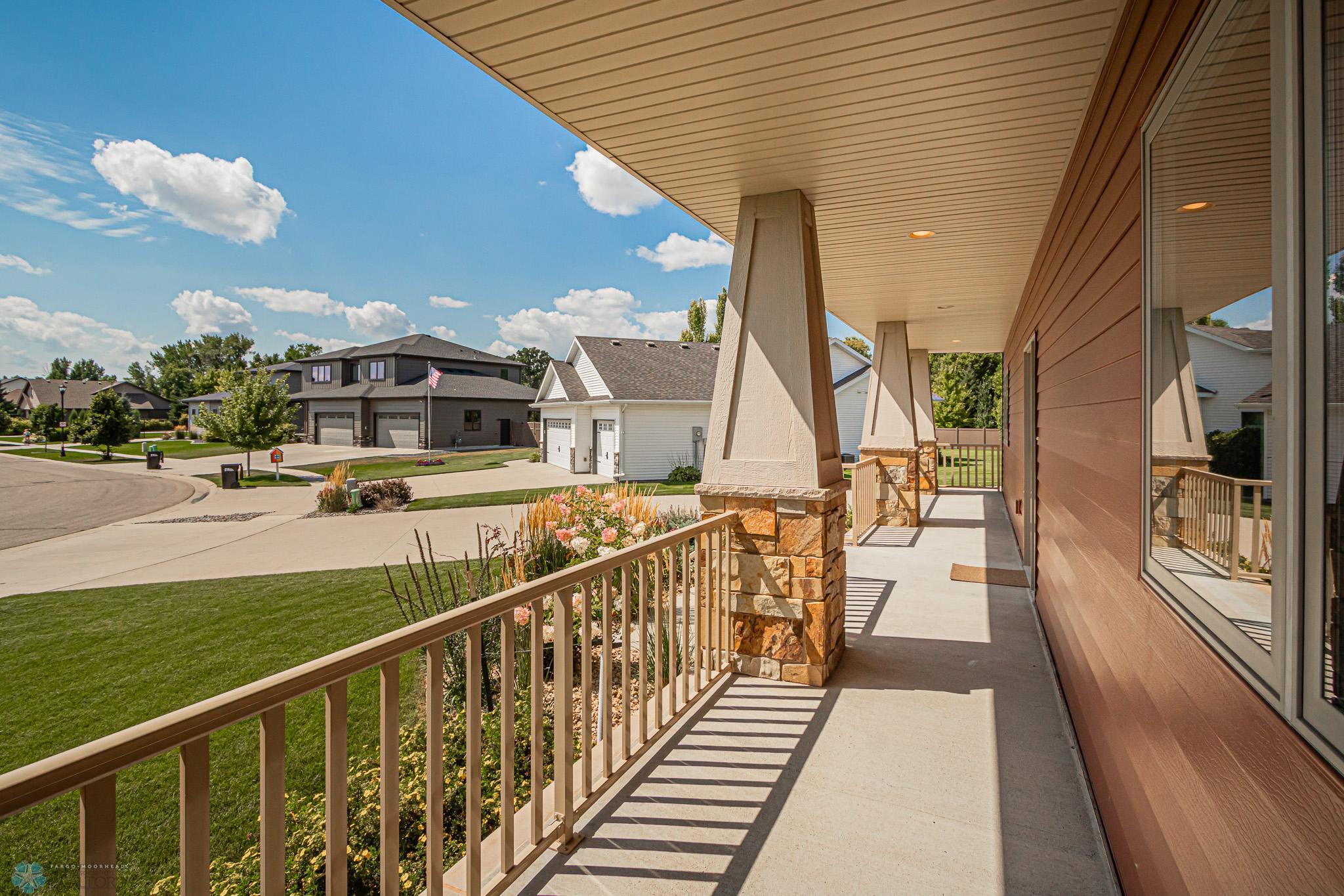 Welcoming Front Porch - beckons you to relax & enjoy your morning coffee!