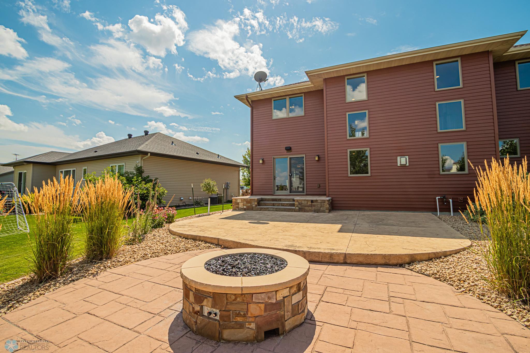 3-Level Stamped Concrete Patio with Gas Firepit - ready for your fall gatherings!