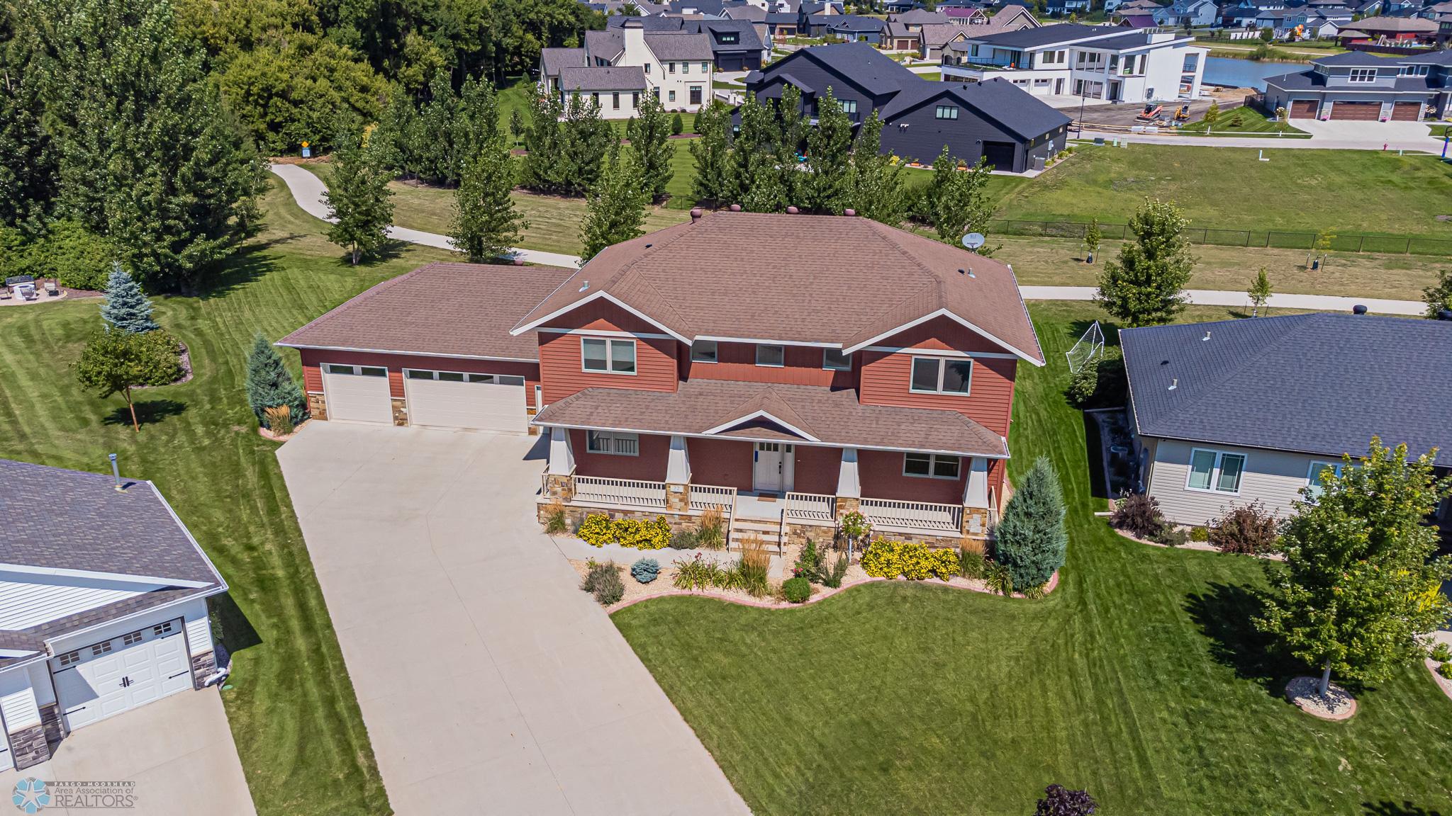 Aerial View Looking North to Walking Path behind home