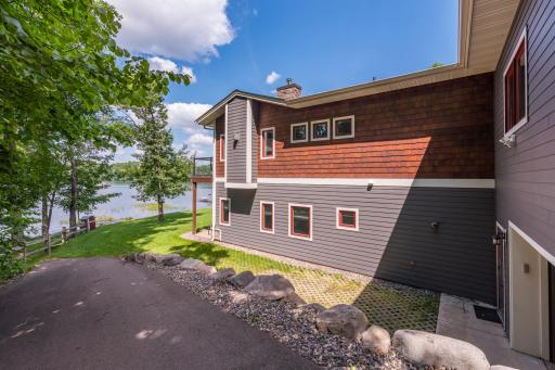 Private driveway/path down to the lake and lower garage access