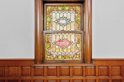 Including a gorgeous hand-carved buffet, incredible paneling, and stained glass.