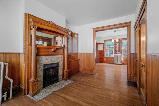 The main level original living area with fireplace.