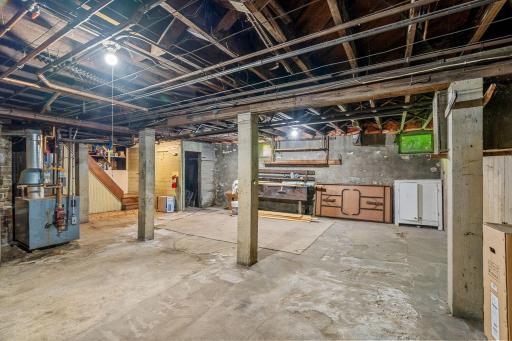 Full, massive basement for potential 6th unit.