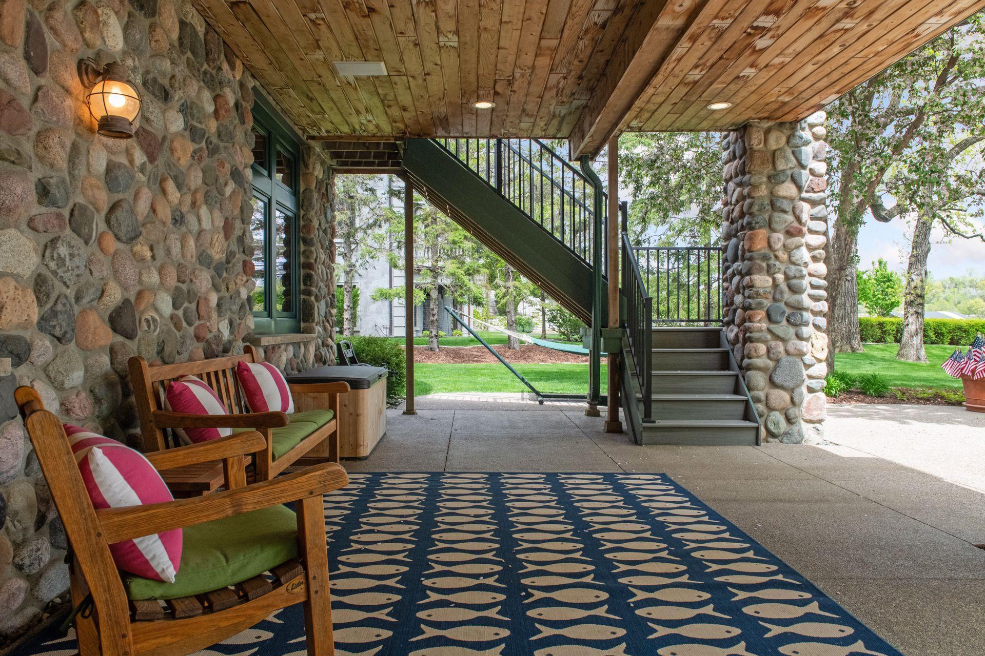 Seeking shade? Great option to sit and take in the backyard fun and lake activities right here.