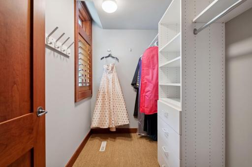 Large walk in closet to en suite bedroom one in lower level.