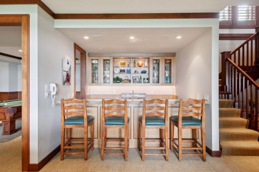 The bar is always a great gather spot to grab a beverage or make toasts to your friends or guests.