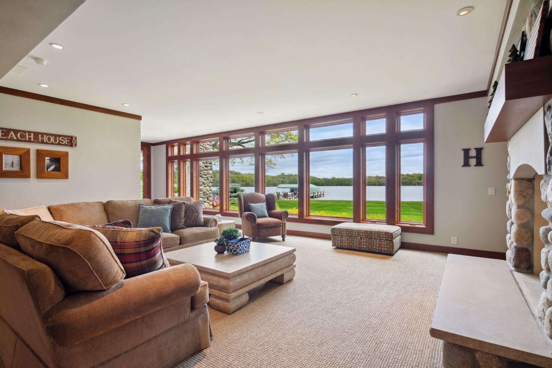 Never a dull moment in your family room to miss what is happening in your backyard or on the lake. Enjoy 9ft ceilings with multiple built-ins for games