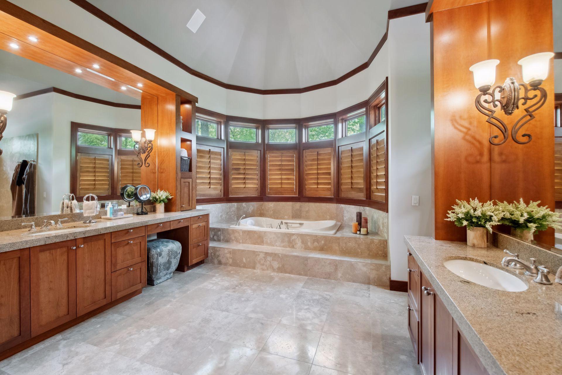 The primary bathroom suite will please buyers. Spacious, dual vanities with built-in cabinetry offering tons of storage. Relax in your jacuzzi tub or take a bubble bath at the end of your day.