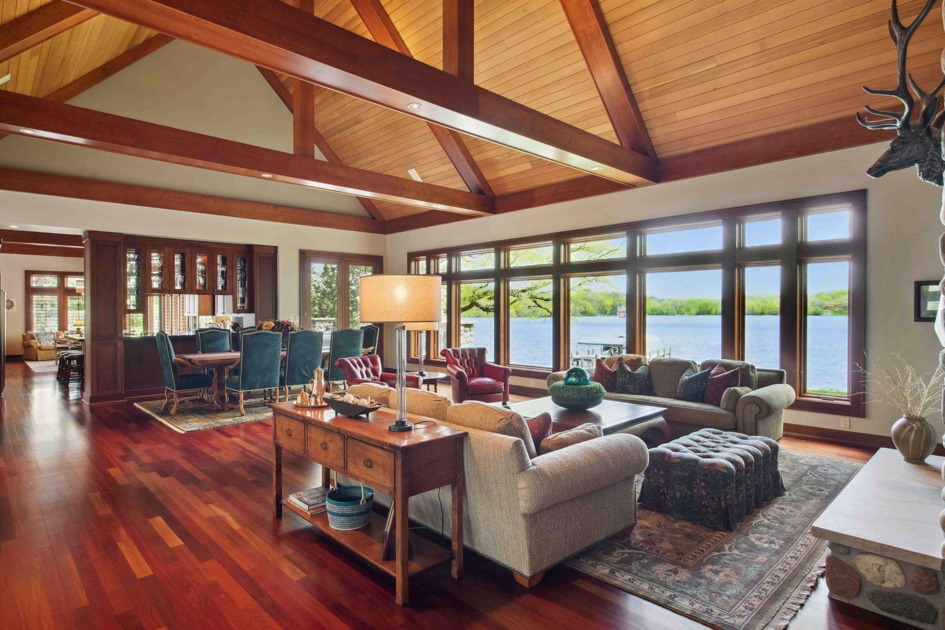 Meticulous home throughout with impeccable quality. Cherry floors on main with 24ft soaring vault ceilings in main level living room / great room. Open concept living for all to be included no matter where you are on the main floor.