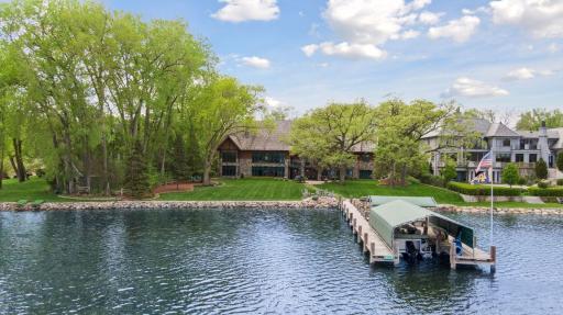 Nestled on 1.26 acres with rip rap shoreline and 75ft permanent dock includes 2 slips 33x11 and 19x11
