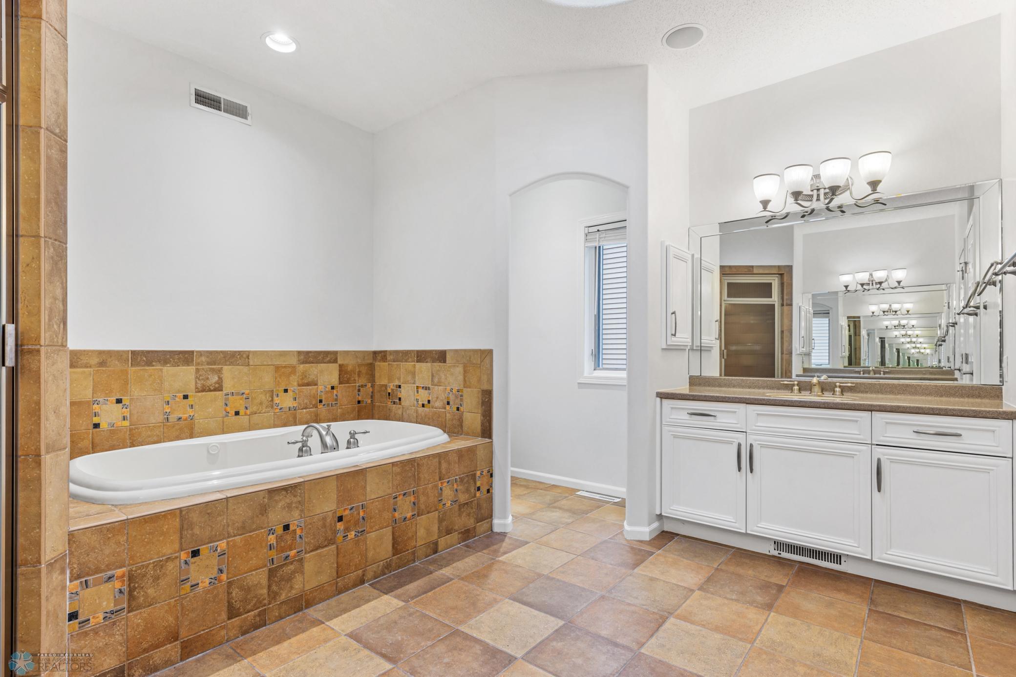 Primary Suite Bath With Jetted Tub
