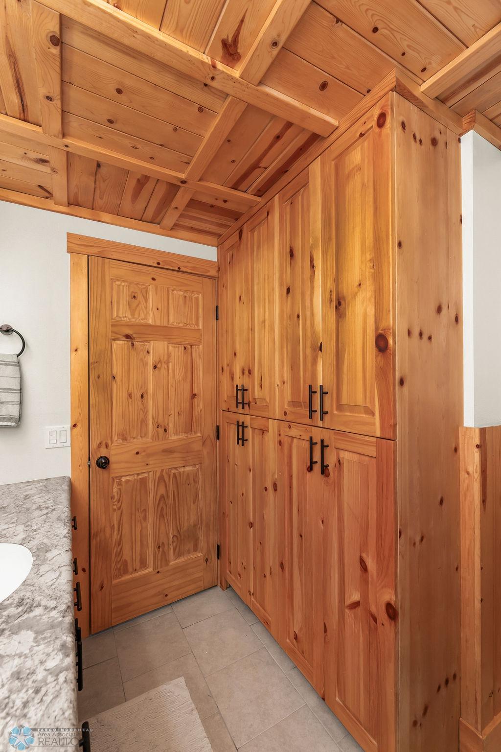 Huge linen/storage closet in the basement bath