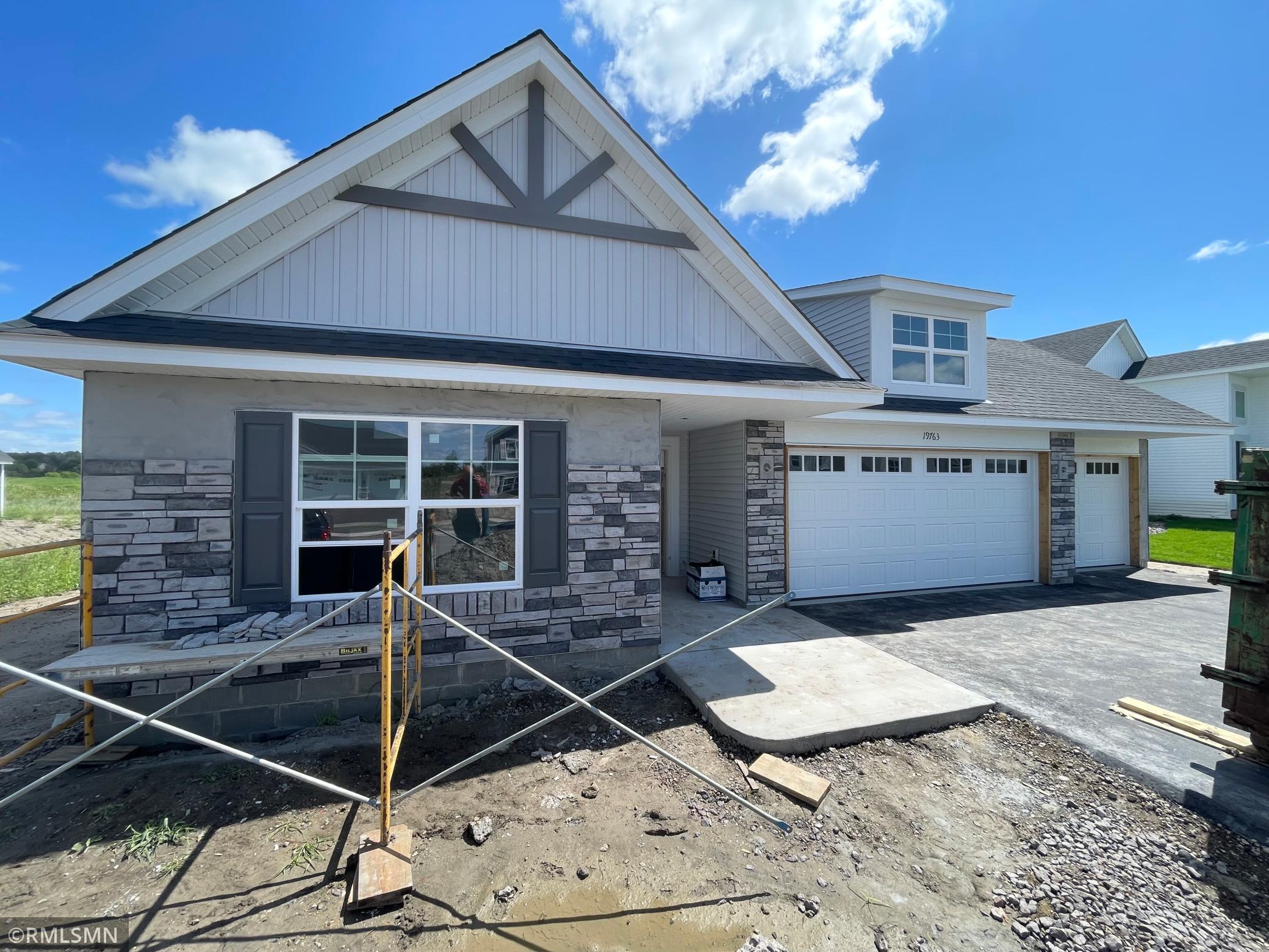 Beautiful curb appeal, excellent main level living floor plan, huge garage with attic storage, and amazing homesite backed up to wetland! Come make it yours!