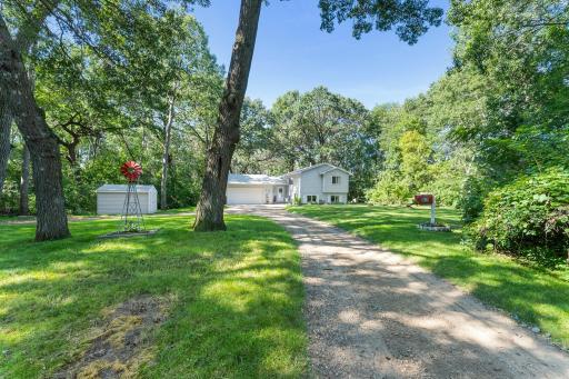 This 2nd owner home is nestled at the end of 317th. You will hear I35 but sellers said they don't notice it - been there 20+ yrs. Their neighbors been there over 30 yrs.