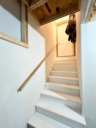 Stairs from basement to garage