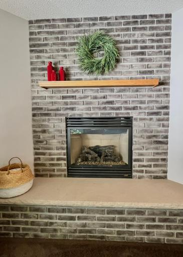 Fireplace in den