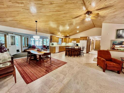 Dining to kitchen and den