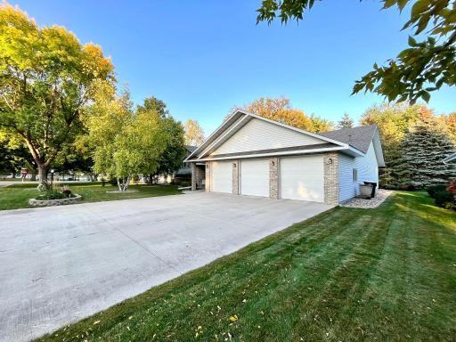 SW corner of home and concrete driveway