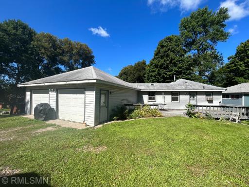 Make this place your own, across the street from Sugar Lake, with great views of the lake from your living room and bedroom windows. Back deck measures 31x12. Relax and sip your favorite beverage