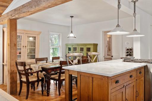 The informal dining room is adjacent to the kitchen and newer family room addition.