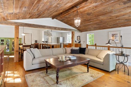 The family room can accommodate many people and is a great place to relax or watch movies.