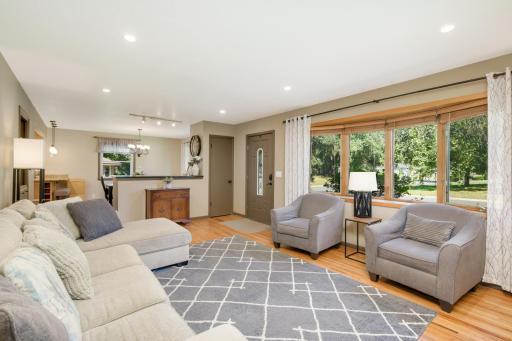 Main level family room, bay window and hardwood floors