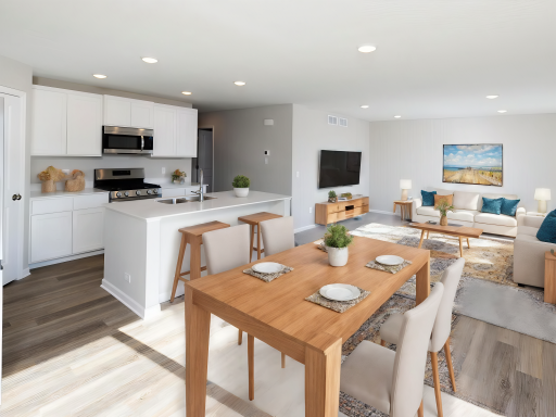 Photo for 5388 161st Street N, Hugo, MN 55038 - listing #6584465 Open Concept Living Area. Virtually Staged. Photo taken of another home with similar plan and finishes. Photos and renderings may not depict actual plan, materials, & finishes may vary. All measurements are approximate.