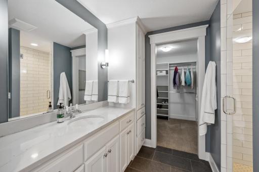 The 3/4 bath is elegantly designed with a modern shower, sleek vanity, and tasteful finishes. It offers all the essentials for comfort and convenience, creating a stylish yet functional space.