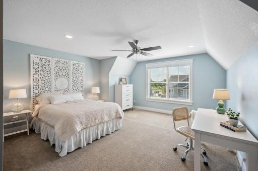 The large second bedroom on the upper level offers comfort and privacy, featuring its own 3/4 bath and a spacious walk-in closet. This inviting retreat provides ample space for relaxation.