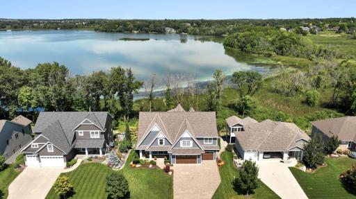 The expansive yard is beautifully landscaped and features a 25x12 front porch that adds to the homeâs inviting charm.