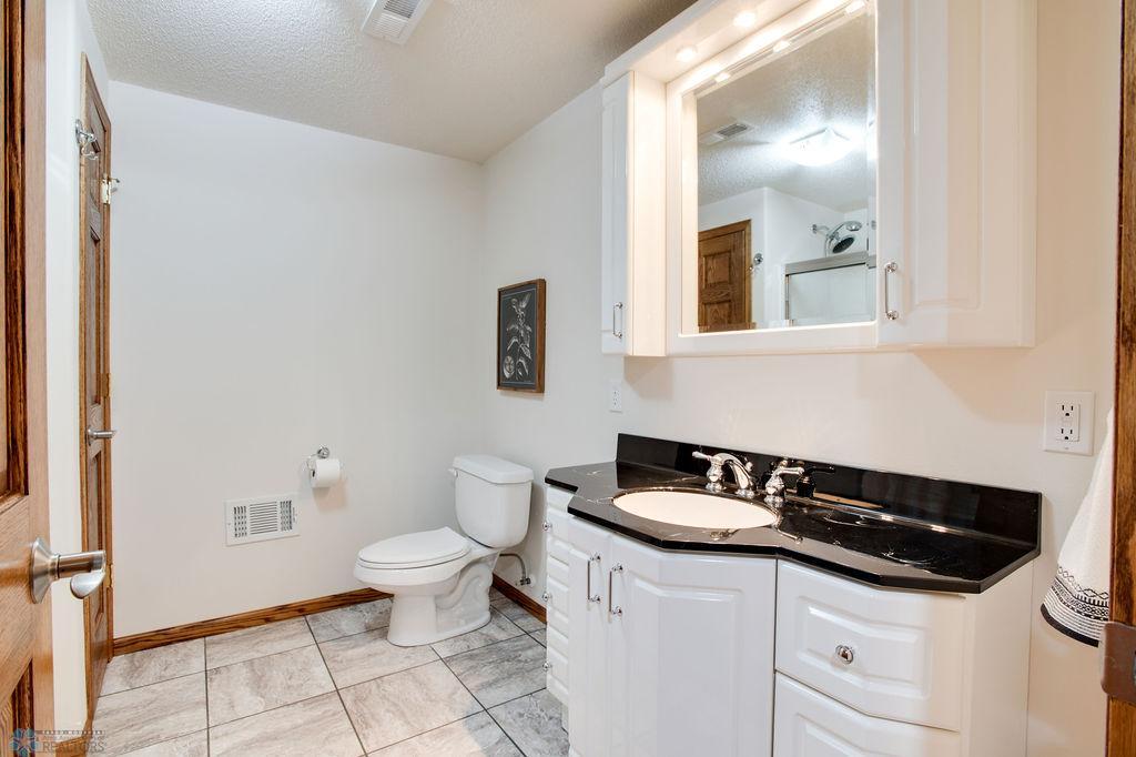 Basement bathroom w/walk in shower