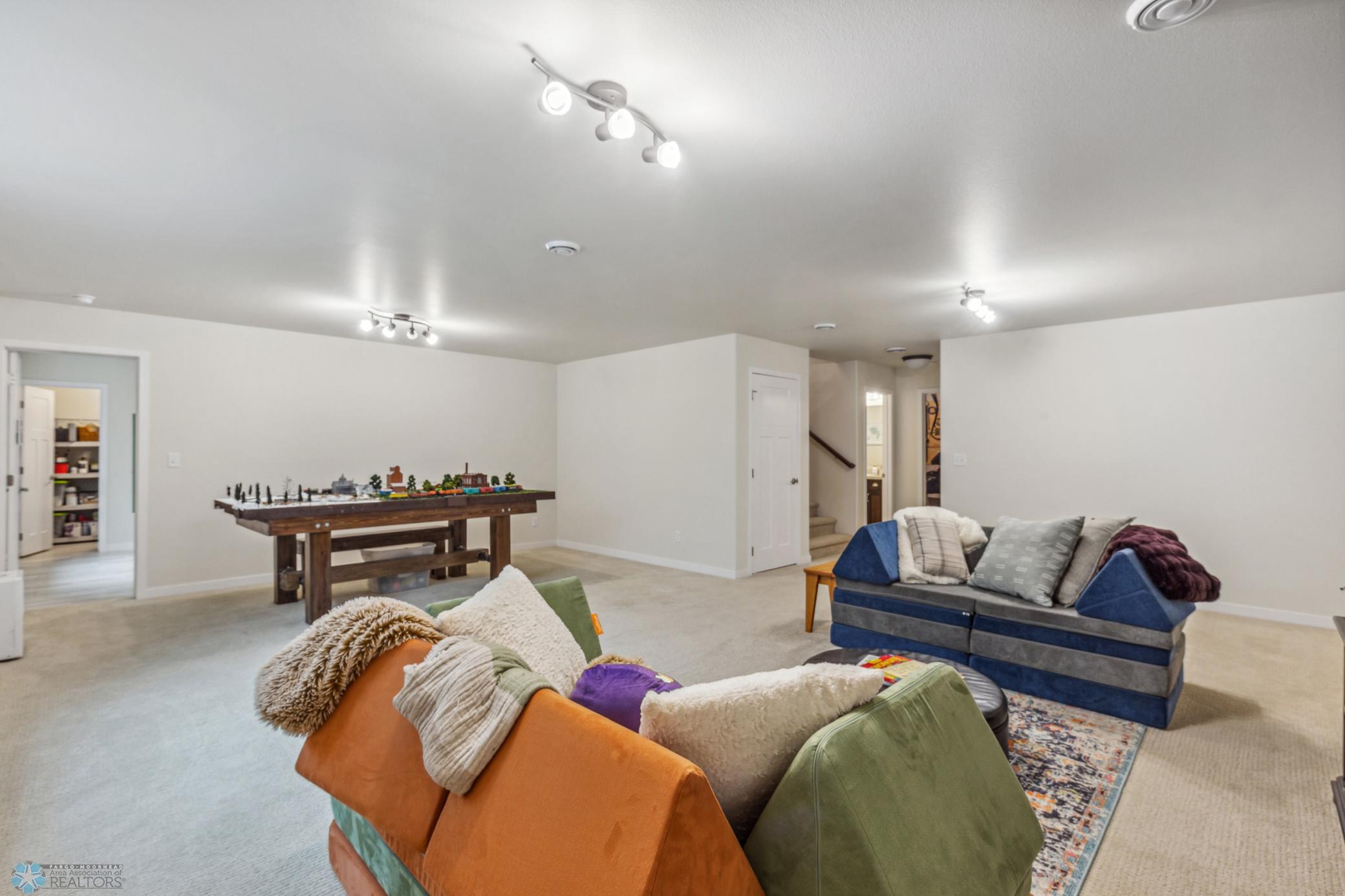 Lower Level Living Room to Rec Space