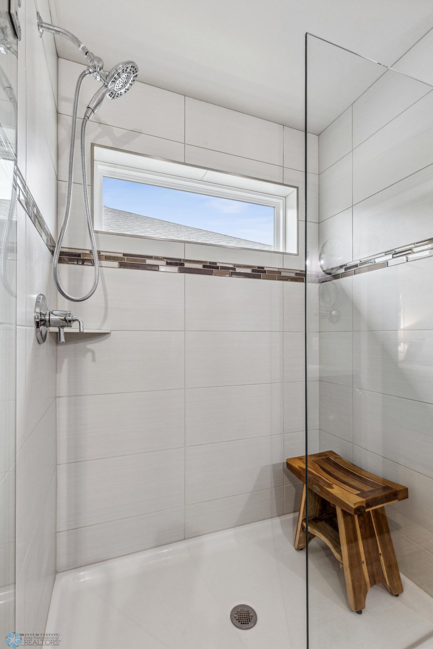 Tile Shower In Primary Bathroom