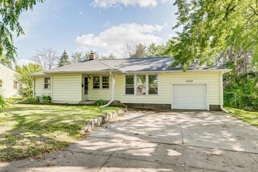 Welcome home to 2042 Cottage Ave in St. Paul! Featuring an attached garage and extra wide concrete driveway!