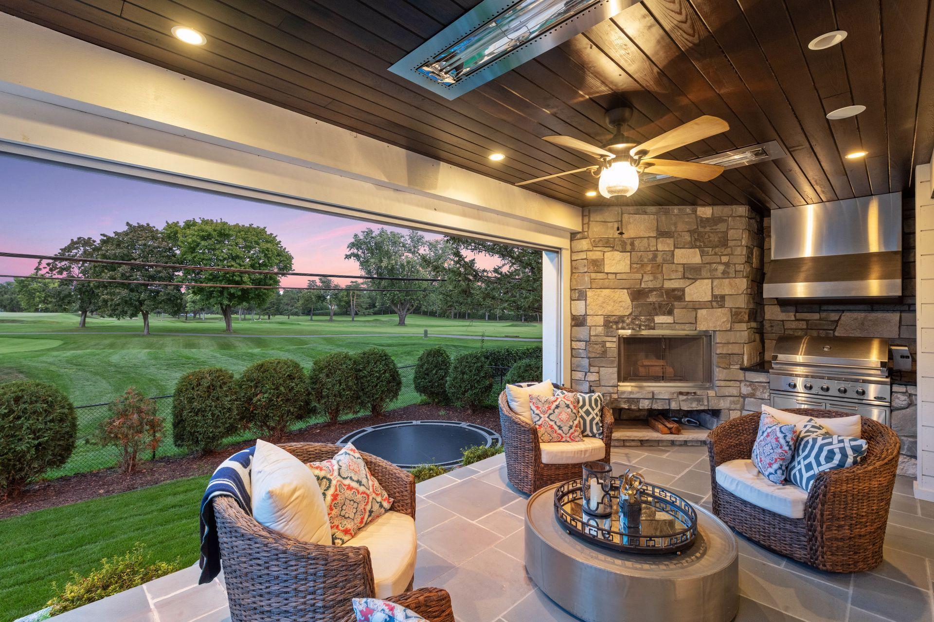 Screen porch with phantom screens & fireplace