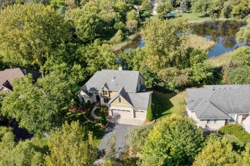 Welcome to 6631 Sherman Lake in Pheasant Hills Preserve, Lino Lakes! Immersed in nature, this home faces and wooded lot, then backs up to a pond in back. Private feel without being isolated.